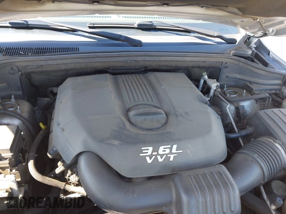 2011 Jeep Grand Cherokee Laredo with VIN 1J4RS4GGXBC513523, listed as a IAAI auction lot 42203802 with 242,239 mi miles and . Bid and sale history available at DreamBid. Image 10.