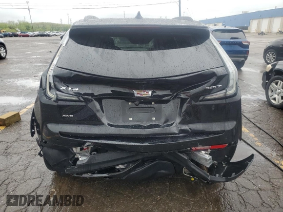 2022 Cadillac XT4 AWD Sport с VIN 1GYFZFR46NF170841, выставлен на аукционе Copart как лот 55863705 с пробегом 14 745 миль миль и Списание • Salvage title. История ставок и продаж доступна на DreamBid. Изображение 6.