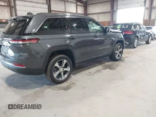 2022 Jeep Grand Cherokee with VIN 1C4RJYB65N8758560, listed as a IAAI auction lot 42182021 with 28,096 mi miles and . Bid and sale history available at DreamBid. Image 4.