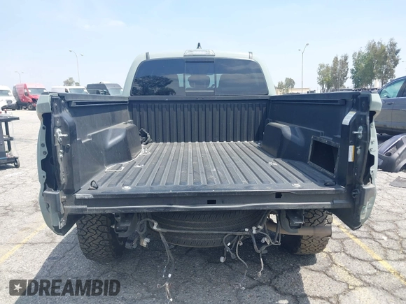 2022 Toyota Tacoma SR5 with VIN 3TMBZ5DN1NM035572, listed as a IAAI auction lot 42083925 with 82,596 mi miles and . Bid and sale history available at DreamBid. Image 17.