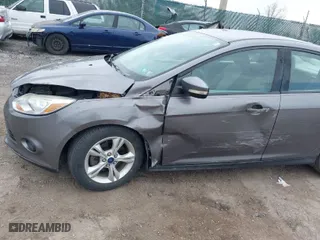2014 Ford Focus SE with VIN 1FADP3F22EL395592, listed as a IAAI auction lot 41915197 with 103,537 mi miles. Bid and sale history available at carsss.com. Image 6.