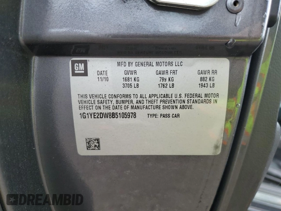 2011 Chevrolet Corvette 1LT z VIN 1G1YE2DW8B5105978, wystawiony jako Copart lot #75264194 z przebiegiem 144 427 mil mil oraz Szkoda całkowita • Salvage title. Historia ofert i sprzedaży dostępna na DreamBid. Obrazek 14.