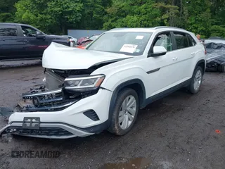 2021 Volkswagen Atlas SE z VIN 1V2KE2CAXMC202664, wystawiony jako IAAI lot #42292276 z przebiegiem 57 760 mil mil oraz . Historia ofert i sprzedaży dostępna na DreamBid. Obrazek 2.