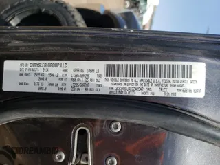 2014 Ram 3500 Big Horn with VIN 3C63R3DJ4EG240542, listed as a Copart auction lot 65465704 with 129,315 mi miles and Salvage Title. Bid and sale history available at carsss.com. Image 12.