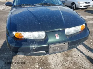 2000 Saturn SL z VIN 1G8ZK5271YZ165467, wystawiony jako IAAI lot #42367156 z przebiegiem 185 962 mil mil oraz . Historia ofert i sprzedaży dostępna na DreamBid. Obrazek 15.