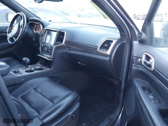 2014 Jeep Grand Cherokee Overland with VIN 1C4RJFCT8EC380899, listed as a IAAI auction lot 41372034 with 140,413 mi miles. Bid and sale history available at carsss.com. Image 5.