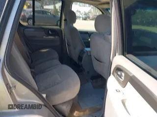 2005 GMC Envoy SLT with VIN 1GKDT13S952219826, listed as a IAAI auction lot 41783713 with 212,908 mi miles. Bid and sale history available at carsss.com. Image 8.