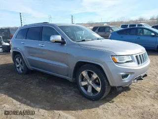 2014 Jeep Grand Cherokee Overland with VIN 1C4RJFCT8EC246264, listed as a IAAI auction lot 41692795 with 197,851 mi miles. Bid and sale history available at carsss.com. Image 1.