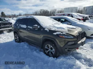 2014 Jeep Cherokee Trailhawk with VIN 1C4PJMBS2EW310818, listed as a Copart auction lot 44581755 with 105,560 mi miles and Non repairable. Bid and sale history available at DreamBid. Image 4.