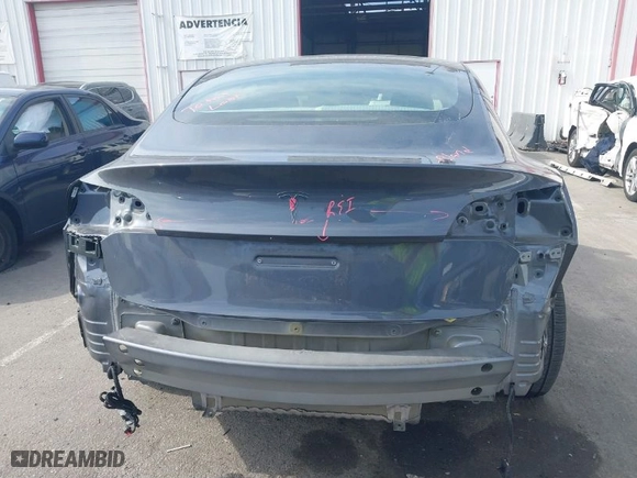 2023 Tesla Model 3 with VIN 5YJ3E1EA0PF577869, listed as a IAAI auction lot 41468956 with 38,760 mi miles. Bid and sale history available at carsss.com. Image 16.