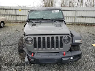 2018 Jeep Wrangler Unlimited Rubicon with VIN 1C4HJXFNXJW196460, listed as a Copart auction lot 49681715 with 71,187 mi miles and Salvage title. Bid and sale history available at DreamBid. Image 5.