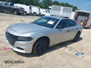 2021 Dodge Charger Police z VIN 2C3CDXAT3MH578330, wystawiony jako IAAI lot #42604008 z przebiegiem 92 856 mil mil oraz . Historia ofert i sprzedaży dostępna na DreamBid. Obrazek 2.