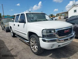 2005 GMC Sierra 1500 SLE with VIN 2GTEK13T851151711, listed as a IAAI auction lot 41964392 with 202,073 mi miles. Bid and sale history available at carsss.com. Image 1.