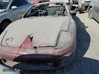 2001 Mitsubishi Eclipse GS with VIN 4A3AE45GX1E147768, listed as a Copart auction lot 56972504 with 0 mi miles and Non Repairable. Bid and sale history available at carsss.com. Image 5.