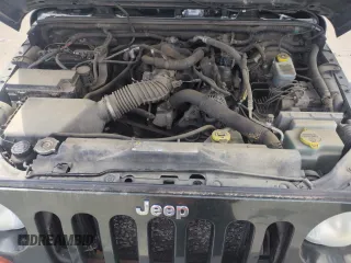 2010 Jeep Wrangler Sport with VIN 1J4AA2D16AL127197, listed as a Copart auction lot 54192935 with 200,595 mi miles and Clean Title. Bid and sale history available at carsss.com. Image 11.