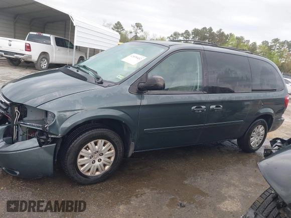 2006 Chrysler Town & Country LX with VIN 2A4GP44R96R615942, listed as a IAAI auction lot 42039452 with 158,009 mi miles and . Bid and sale history available at DreamBid. Image 14.