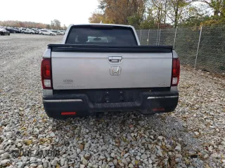 2018 Honda Ridgeline RTL-T z VIN 5FPYK3F60JB011620, wystawiony jako Copart lot #77128654 z przebiegiem 136 738 mil mil oraz Szkody całkowita. Historia ofert i sprzedaży dostępna na DreamBid. Obrazek 6.