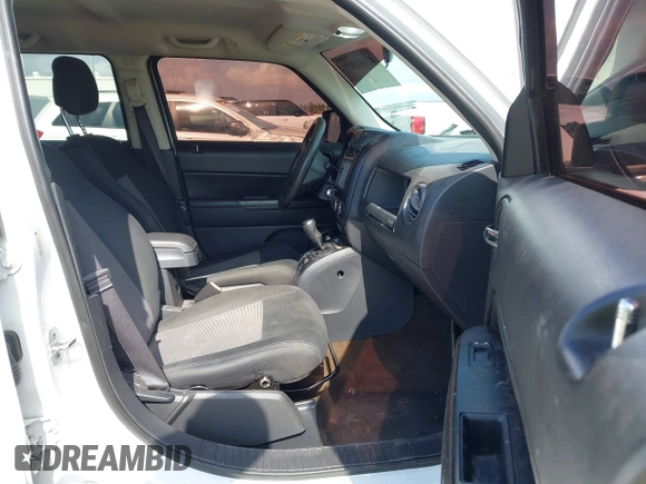 2014 Jeep Patriot Sport with VIN 1C4NJPBA8ED772974, listed as a IAAI auction lot 42401827 with 140,761 mi miles and . Bid and sale history available at DreamBid. Image 5.