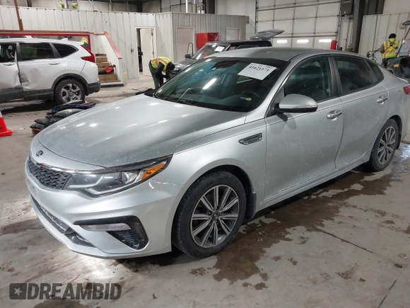 2019 Kia Optima LX with VIN 5XXGT4L39KG354118, listed as a IAAI auction lot 41621171 with 96,441 mi miles. Bid and sale history available at carsss.com. Image 2.