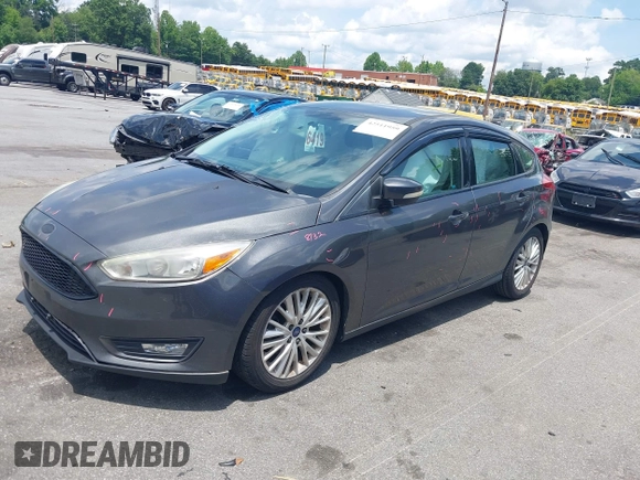 2016 Ford Focus Titanium with VIN 1FADP3N20GL275763, listed as a IAAI auction lot 42511959 with 124,891 mi miles and . Bid and sale history available at DreamBid. Image 2.