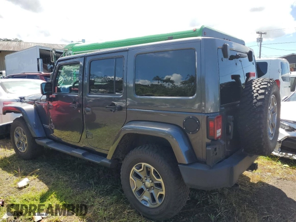 2014 Jeep Wrangler Unlimited Rubicon with VIN 1C4HJWFG7EL302897, listed as a Copart auction lot 48969425 with 57,976 mi miles and Salvage title. Bid and sale history available at DreamBid. Image 2.