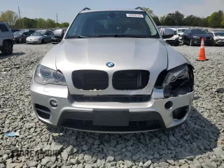 2013 BMW X5 xDrive35i z VIN 5UXZV4C53D0E03842, wystawiony jako Copart lot #52926155 z przebiegiem 178 275 mil mil oraz Szkoda całkowita • Salvage title. Historia ofert i sprzedaży dostępna na DreamBid. Obrazek 5.