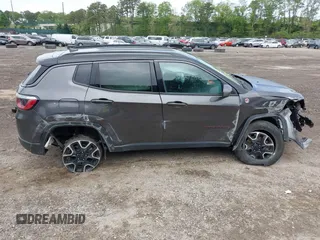 2020 Jeep Compass Trailhawk with VIN 3C4NJDDB3LT200268, listed as a IAAI auction lot 42250192 with 73,804 mi miles and . Bid and sale history available at DreamBid. Image 13.