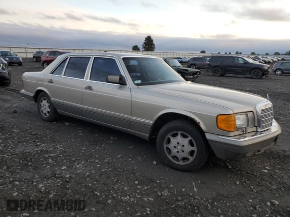 1986 Mercedes-Benz 560 with VIN WDBCA39DXGA239219, listed as a Copart auction lot 82033964 with 181,031 mi miles and Clean Title. Bid and sale history available at DreamBid. Image 4.