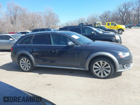 2016 Audi allroad A4 Premium Plus z VIN WA1UFAFL9GA006014, wystawiony jako IAAI lot #41681965 z przebiegiem 93 506 mil mil oraz . Historia ofert i sprzedaży dostępna na DreamBid. Obrazek 13.