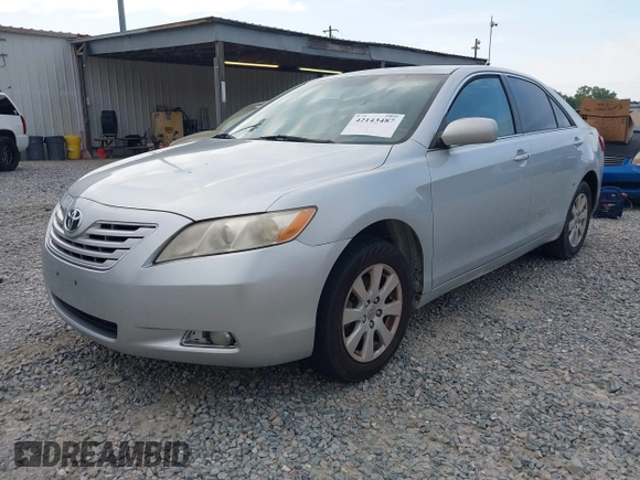2007 Toyota Camry LE with VIN 4T1BK46KX7U530347, listed as a IAAI auction lot 42143487 with 254,337 mi miles and . Bid and sale history available at DreamBid. Image 2.