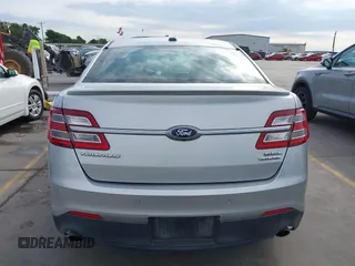 2015 Ford Taurus SEL z VIN 1FAHP2E88FG133328, wystawiony jako IAAI lot #42179649 z przebiegiem 127 171 mil mil oraz . Historia ofert i sprzedaży dostępna na DreamBid. Obrazek 16.
