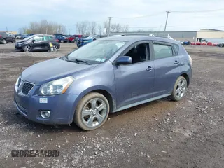 2009 Pontiac Vibe with VIN 5Y2SM67069Z422076, listed as a IAAI auction lot 42158045 with 180,568 mi miles. Bid and sale history available at carsss.com. Image 2.