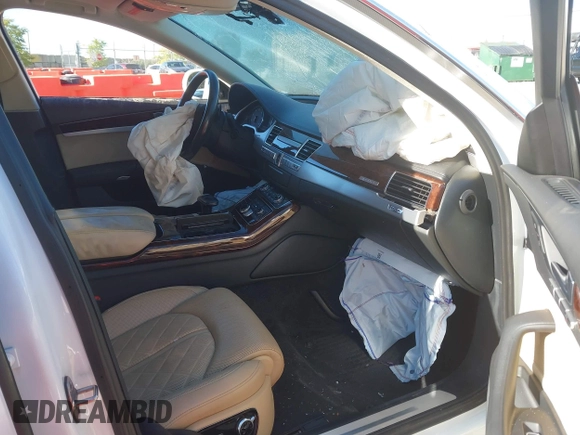 2013 Audi A8 4.0L with VIN WAUA2AFD9DN017867, listed as a IAAI auction lot 40430651 with 114,928 mi miles and . Bid and sale history available at DreamBid. Image 5.