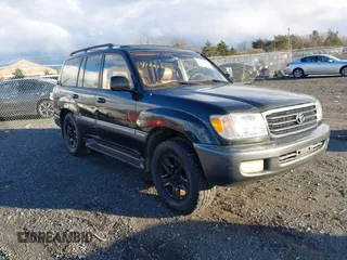 2000 Toyota Land Cruiser with VIN JT3HT05J7Y0110667, listed as a IAAI auction lot 41248220 with 208,043 mi miles. Bid and sale history available at carsss.com. Image 1.