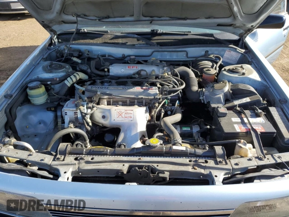 1990 Toyota Camry z VIN 4T1SV24E0LU137556, wystawiony jako Copart lot #84628404 z przebiegiem 247 203 mil mil oraz Czysty tytuł • Clean title. Historia ofert i sprzedaży dostępna na DreamBid. Obrazek 11.