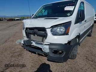 2023 Ford Transit Cargo with VIN 1FTYE1Y82PKA84762, listed as a IAAI auction lot 41718720 with 21,029 mi miles and . Bid and sale history available at DreamBid. Image 6.