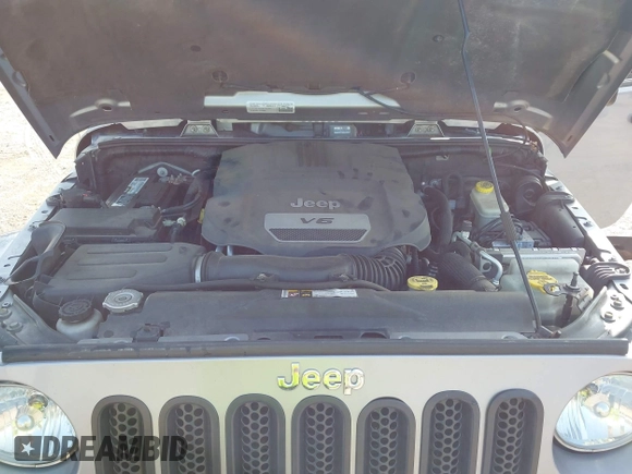 2015 Jeep Wrangler Unlimited Sahara with VIN 1C4BJWEG9FL570780, listed as a IAAI auction lot 42474940 with 116,226 mi miles and . Bid and sale history available at DreamBid. Image 10.