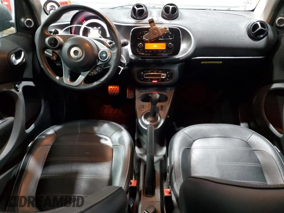 2016 Smart fortwo Passion z VIN WMEFJ5DA9GK067011, wystawiony jako Copart lot #46152325 z przebiegiem 61 195 mil mil oraz Szkody całkowita. Historia ofert i sprzedaży dostępna na DreamBid. Obrazek 8.