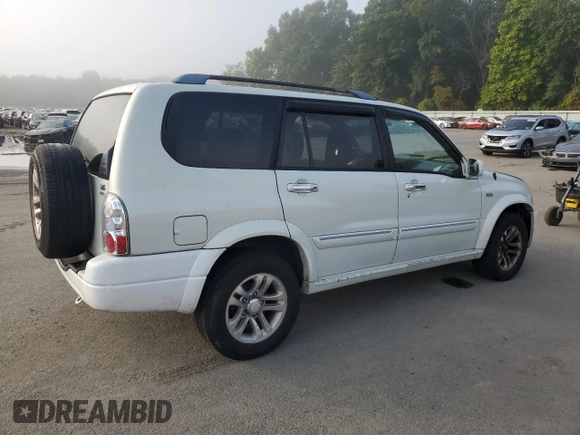2005 Suzuki XL7 LX z VIN JS3TX92V054105368, wystawiony jako Copart lot #71299494 z przebiegiem 165 498 mil mil oraz Czysty tytuł • Clean title. Historia ofert i sprzedaży dostępna na DreamBid. Obrazek 3.