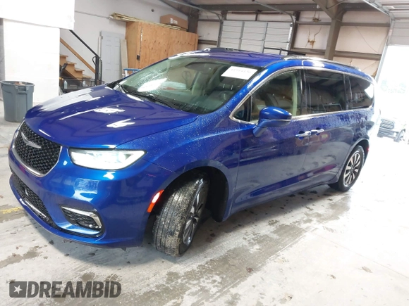 2021 Chrysler Pacifica Touring L z VIN 2C4RC1BGXMR503108, wystawiony jako IAAI lot #41914136 z przebiegiem 98 685 mil mil oraz . Historia ofert i sprzedaży dostępna na DreamBid. Obrazek 2.