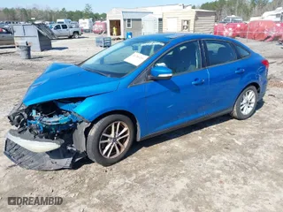 2015 Ford Focus SE with VIN 1FADP3F25FL200831, listed as a IAAI auction lot 41785206 with 141,139 mi miles. Bid and sale history available at carsss.com. Image 2.