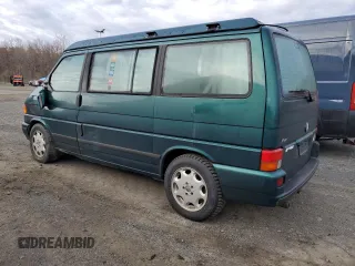 2002 Volkswagen EuroVan MV с VIN WV2NB47092H095600, выставлен на аукционе Copart как лот 50705065 с пробегом 223 049 миль миль и Чистый • Clean title. История ставок и продаж доступна на DreamBid. Изображение 2.