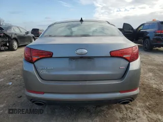 2013 Kia Optima LX z VIN 5XXGM4A70DG221110, wystawiony jako Copart lot #83440674 z przebiegiem Nie podano mil oraz Szkody całkowita. Historia ofert i sprzedaży dostępna na DreamBid. Obrazek 6.