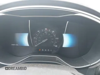 2016 Ford Fusion SE Hybrid z VIN 3FA6P0LU0GR218685, wystawiony jako IAAI lot #42550930 z przebiegiem 178 041 mil mil oraz . Historia ofert i sprzedaży dostępna na DreamBid. Obrazek 7.