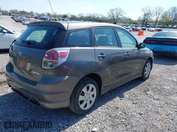 2005 Toyota Matrix STD with VIN 2T1KR32EX5C397965, listed as a IAAI auction lot 41931260 with 135,912 mi miles. Bid and sale history available at carsss.com. Image 4.
