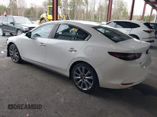 2019 Mazda 3 w/Select with VIN JM1BPACL2K1106916, listed as a IAAI auction lot 42082381 with 63,017 mi miles. Bid and sale history available at carsss.com. Image 3.