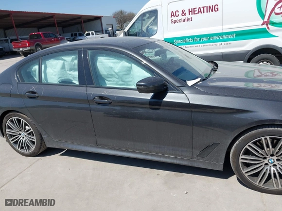 2019 BMW 5 Series 530i xDrive with VIN WBAJA7C50KG910479, listed as a IAAI auction lot 41802413 with 84,932 mi miles. Bid and sale history available at carsss.com. Image 13.