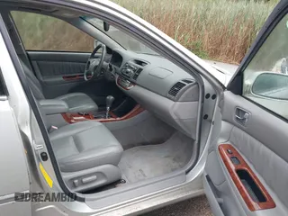 2002 Toyota Camry XLE z VIN JTDBF30K420083381, wystawiony jako IAAI lot #42368073 z przebiegiem 148 746 mil mil oraz . Historia ofert i sprzedaży dostępna na DreamBid. Obrazek 5.