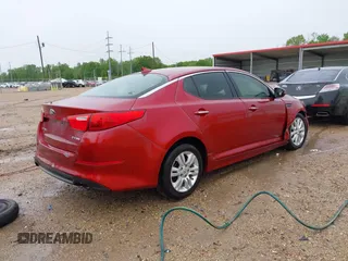 2014 Kia Optima EX z VIN 5XXGN4A76EG281195, wystawiony jako IAAI lot #41875540 z przebiegiem 131 751 mil mil oraz . Historia ofert i sprzedaży dostępna na DreamBid. Obrazek 4.