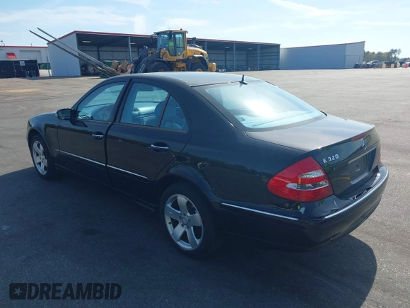 2003 Mercedes-Benz E-Class 3.2L with VIN WDBUF65J33A112308, listed as a IAAI auction lot 41871334 with 138,522 mi miles. Bid and sale history available at carsss.com. Image 3.